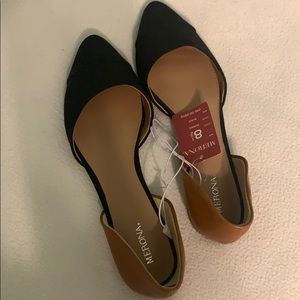Black and brown flats